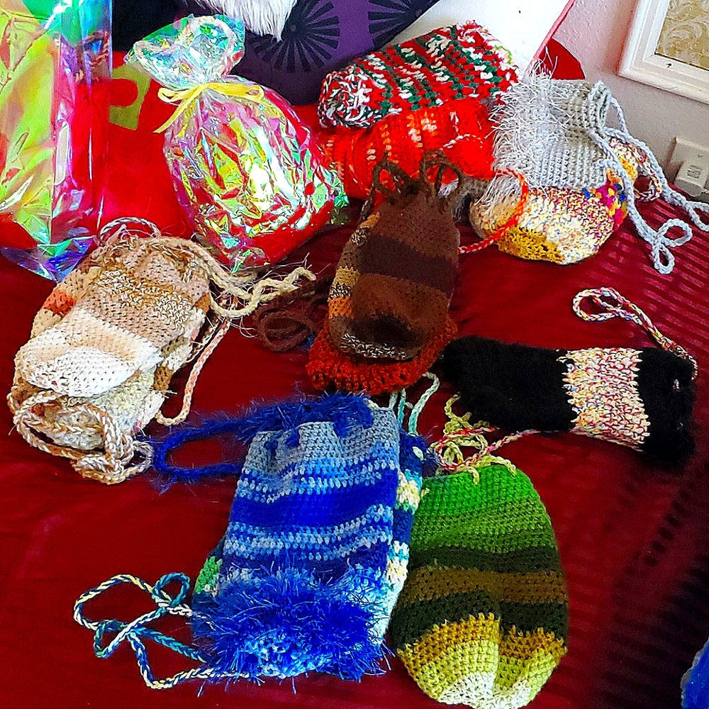 Variety of handmade colorful crochet satchels for